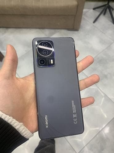 en ucuz telefon redmi note 8: Xiaomi 13 Lite, 256 GB, rəng - Boz, 
 Barmaq izi — 1