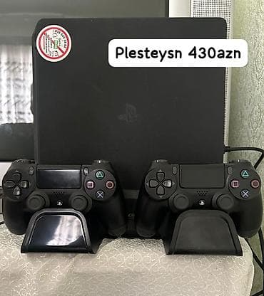 PlayStation 4 Slim oyun konsolu - Komplekt: PS4 Slim konsolu, 2 ədəd