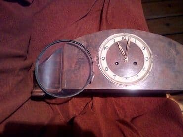 Старинные настольные часы с боем .не работают