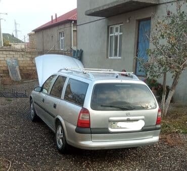 ekskavatör satışı: Opel Vectra Caravan (universal kuzov), gümüşü rəng. - Kuzov: 5 qapı — 4