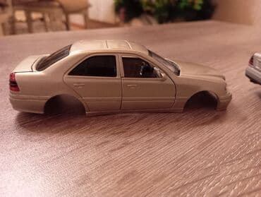 Книги и журналы: Mersedes c 220 modeli kitay istehsalı 1/36 ölcüdədəir .Bu modeli Öz — 8