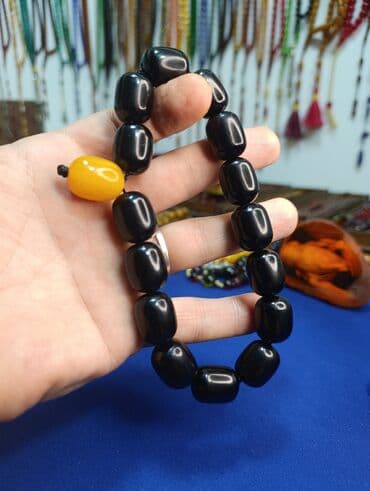 ebonit tesbeh: Sıxma kəhrəba 15×19 ölçülü — 1