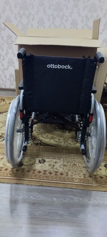 Əlil arabası.Təzədi.Qutuda