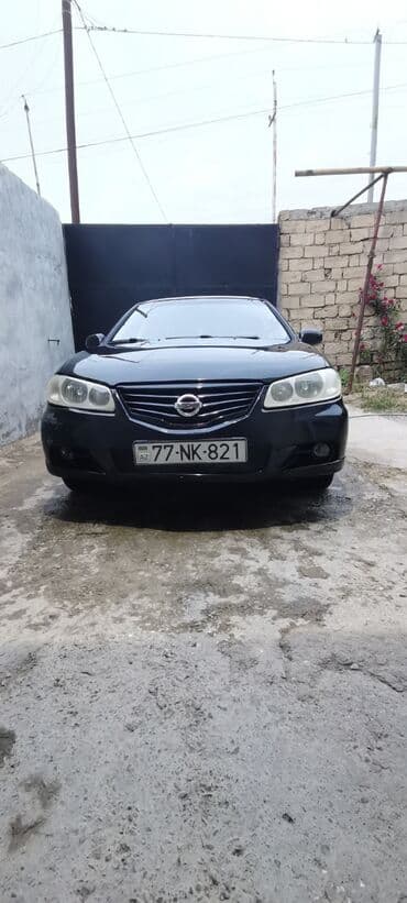 Nissan Sunny: 1.6 l | 2010 il Sedan