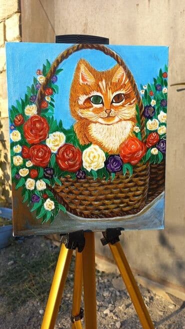 Bu rəsm əsəri səbətdəki pişik balasının təsviridir. Pişik balası