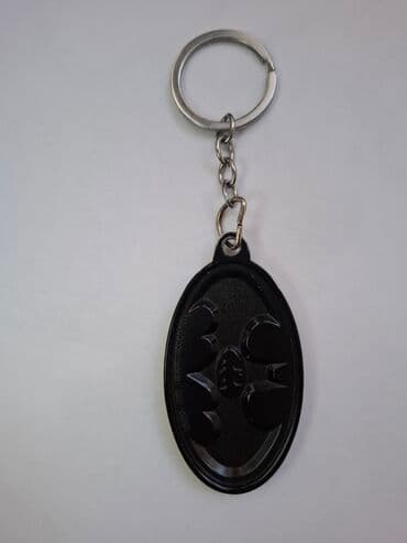 Qazanlar: Batman mövzulu açarlıq - Dizayn: Sarı fon üzərində qara, relyefli — 4