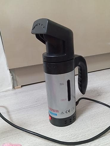 Buxarli Əl Ütüsü. Kompakt paltar buxarlandırıcısı (Handheld Garment