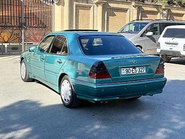 015 fara: Mercedes-Benz C-Class: 2.4 l | 1998 il Sedan — 9