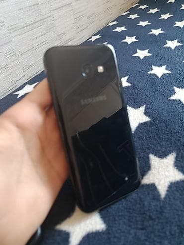 islenmis notebook aliram: Samsung Galaxy A3 2017, 16 GB, rəng - Qara, Barmaq izi — 2