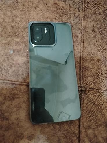 telefon saxlayan: Redmi A1+, 32 GB, rəng - Qara, Barmaq izi — 2