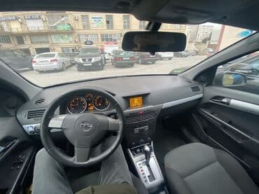 07 masin: Opel Astra: 1.9 l | 2006 il 330000 km Universal — 3