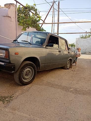 ot bicen traktor satisi: Model: Lada 2107 sedan Rəng: Tünd boz/göy tonları Kuzov: 4 qapı — 5