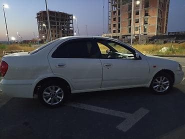 brabus disk: Nissan Sunny: 1.3 l | 2008 il Sedan — 7