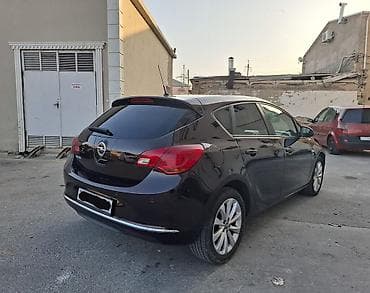 Motonəqliyyat: Opel Astra J hatchback - Kuzov: 5 qapılı hatchback, tünd qəhvəyi/qara — 3