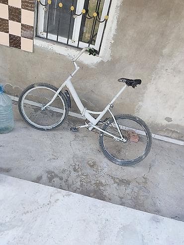 Aşagı yeri var - Rəng: a - Təkərlər: 26" arxa, 24" ön (sıx dişli — 1