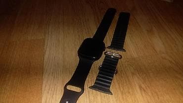 Ağ ekranlı kvadrat formalı smart saat – qara rəngdə. Komplektə: -