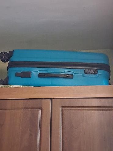 Çamadanlar: Sərnişin çamadanı – bərk korpuslu, mavi rəngdə - Material: sərt — 1