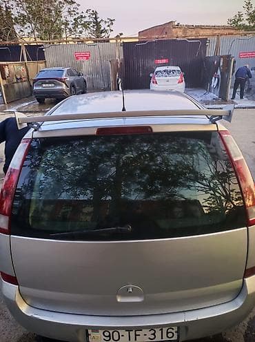 jeep fara: Opel Meriva, gümüşü rəng, 5 qapı, şəhər və ailə istifadəsi üçün rahat — 3