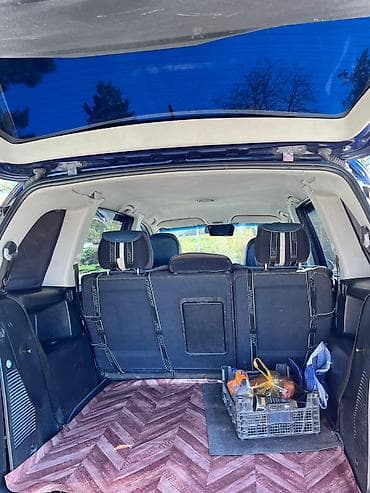 запчасти форд фокус 1: Opel Zafira A, qara rəng, 7 yerlik miniven. Xüsusiyyətlər: - Geniş — 7