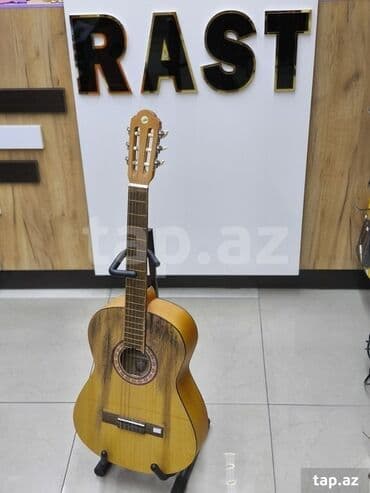 Musiqi alətləri: Klassik gitara, Yeni, Ünvandan götürmə — 1