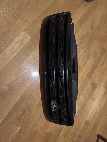 Транспорт: Land Rover Discovery 5 ön radiator barmaqlığı (orijinal emblemli) — 2