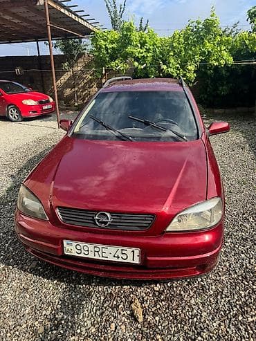 Opel: Opel Astra Caravan (Universal), qırmızı gövdə yalnız kredetlə — 4