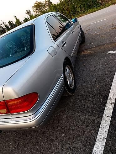 opel astra opel astra: Mercedes-Benz 200: 2 l | 1998 il Sedan — 5