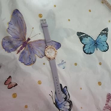 openbugbounty"><script>alert("openbugbounty")<script>: Dairəvi kadranlı və bəzəkli çərçivəli bu qadın kvars saatları — 4