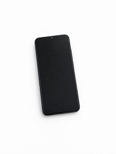 Şık, qara rəngli smartfon Xüsusiyyətlər: - Tam ekranlı ön panel lalafo.az -da Şık, qara rəngli smartfon Xüsusiyyətlər: - Tam ekranlı ön panel