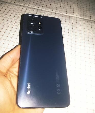 xiaomi telefon: Xiaomi 12, 128 GB, rəng - Qara, 
 Simsiz şarj, İki sim kartlı, Face ID — 1