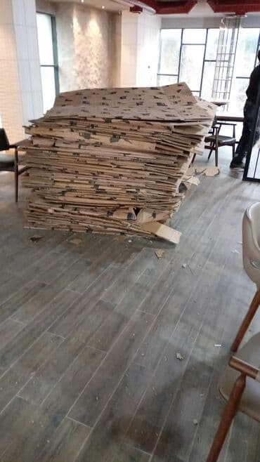 Настольные наборы: Karton qutular – iri ölçülü, yastı şəkildə yığılmış. Məhsul təsviri — 2