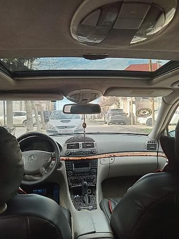 merse: Mercedes-Benz E‑Sinfi sedan (W211 kuzov), tünd mavi rəng. 2.7 cdi — 10