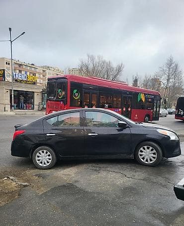 nissan az: Nissan Versa (sedan), qara rəng. - Kuzov: 4 qapılı sedan, aerodinamik — 1