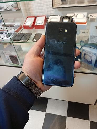 lords mobile: Samsung Galaxy J4 Plus, 2 GB, rəng - Qara, Zəmanət, Sensor, Barmaq izi — 1