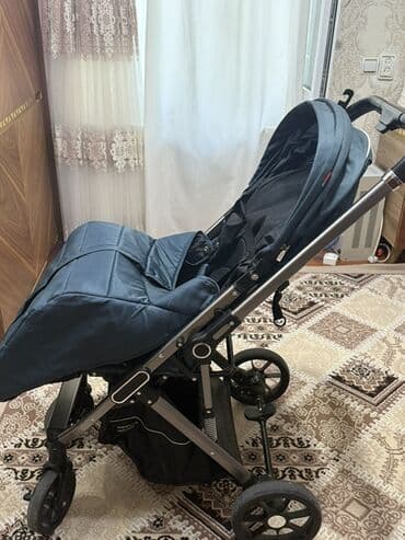 uşağ maneji: Kidilo firmasının tünd göy rəngli uşaq arabası. Üzərində ayaq üçün — 1