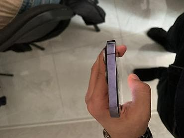 iphone 15 pro max nece manatdir: IPhone 14 Pro, Deep Purple, Face ID — 2