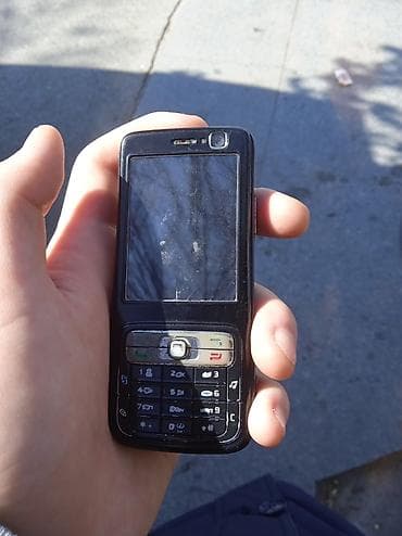 телефон fly ff247 black: Nokia N73, цвет - Черный, Кнопочный — 1