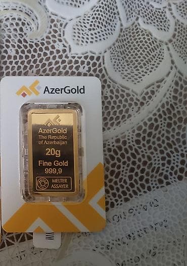 999 əyarlı 20 qram qızıl külçə var məndə Azərgold istehsalı, yenidir — 2