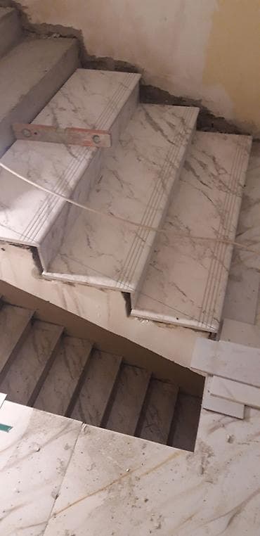 Bitirmə işləri: Kafel metlax işi görülür - Material: parlaq səthli mərmər effektli — 2