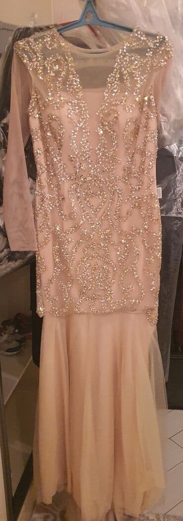 Bir defe toya geyinilib. Brenddir. 550 manata alinib ela