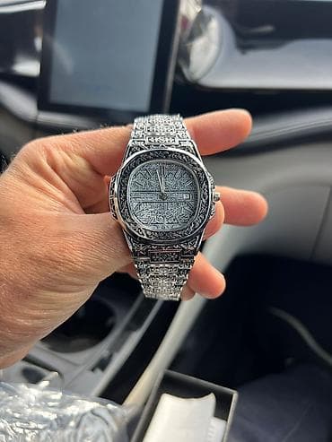 Kişi qol saatı – gümüş tonlu, tamamilə oyma naxışlarla işlənmiş metal — 2