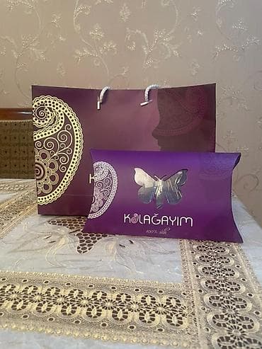 Paltolar: Məhsul: Kəlağayı – 100% ipək Təsvir: - Brend: Kəlağayım — 2
