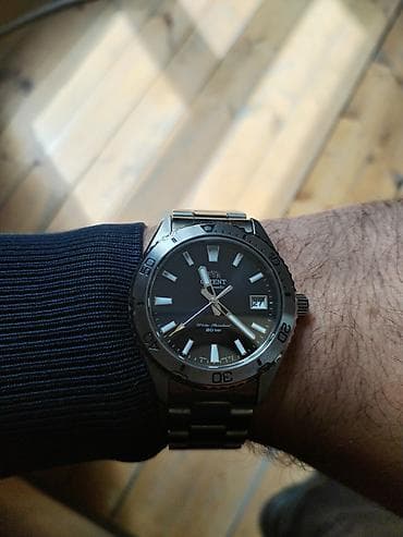 swatch saatlari: Qol saatı, Orient, rəng - Qara — 1