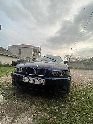 prius c: BMW 528: 2.8 l | 1998 il Sedan — 5