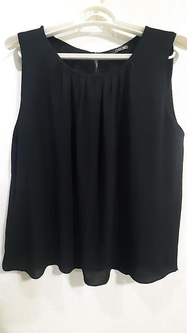 Norah qadın bluzası – ölçü 42 - Rəng: qara - Model: qolsuz, dairəvi