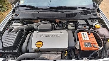 opel vektra 1995: Opel Astra G sedan/hetçbek, gümüşü rəng. - Mühərrik: ECOTEC benzin, 4 — 3