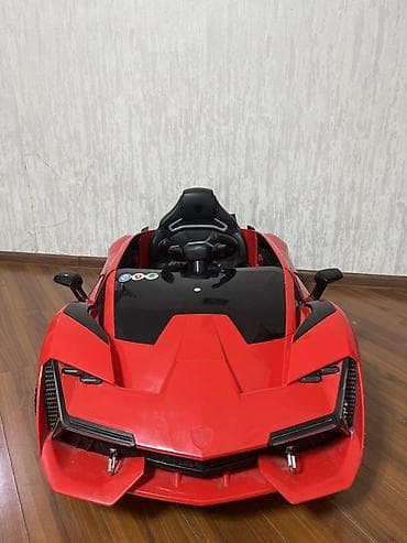 Uşaq geyimi və ayaqqabıları: Uşaq üçün elektrikli miniatür idman avtomobili - Rəng: qırmızı — 1