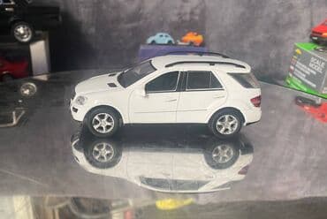 metbex tavan modelleri: Коллекционная модель Mercedes-Benz ML500 W164 white 2007 DeAgostini — 2