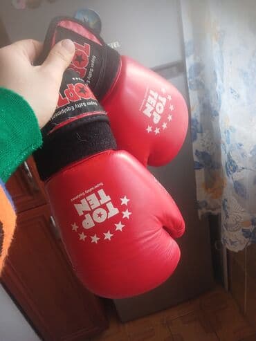 Məhsul: TOP TEN boks əlcəkləri (cüt) Xüsusiyyətlər: - Rəng: qırmızı -