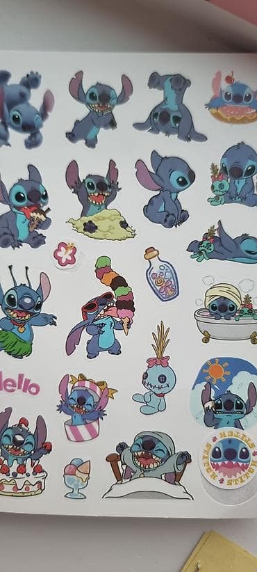 sevgililer ucun hediyyeler: Məhsul: Cizgi qəhrəmanlı yapışqanlı dəftər və stiker dəsti ikisi bir — 6